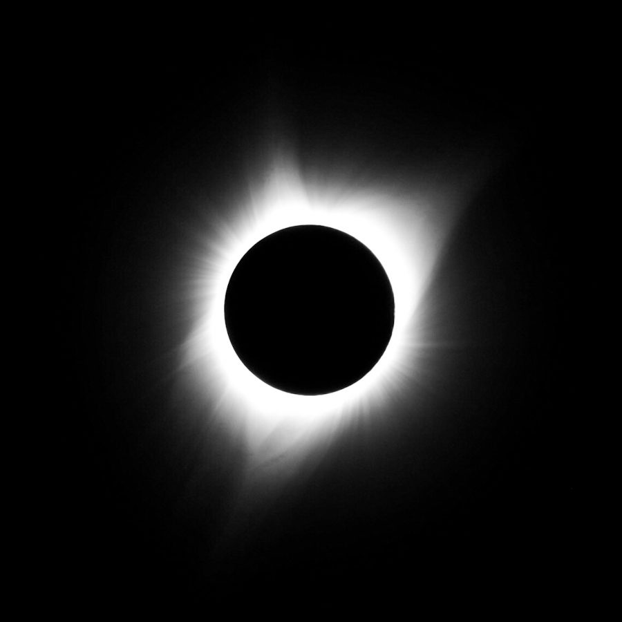 At 11:31 AM MDT, the eclipse hit maximum totality and the solar corona shines bright in the sky. 
