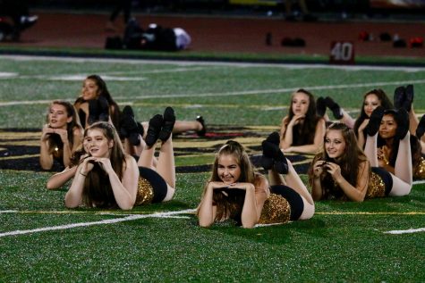 Sophomores Talia Walsh, Megan Campbell, Gwendolyn Warnock, and Chloe Escalante all strike a sassy pose to capture the audiences attention.