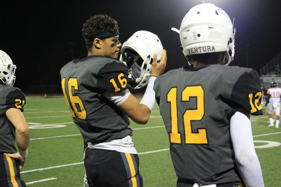 From Left to right: Seniors Joey Thompson and Louie Garza take a breather in-between drives