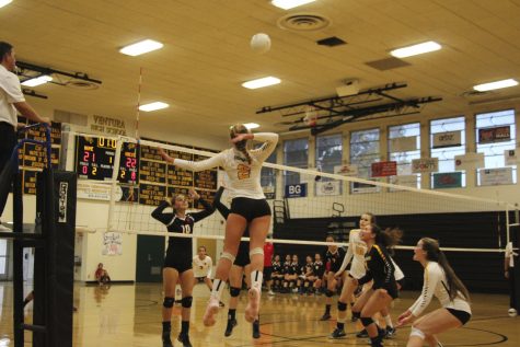 Sinclair jumping up for a spike on Rio Mesa. Photo By: Summer Yovanno