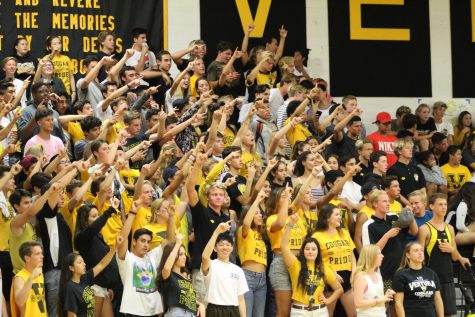 VHS's spirit section points to the score board after BHS yelled 'scoreboard' when obtaining a lead
Photo by: Brooke Newman