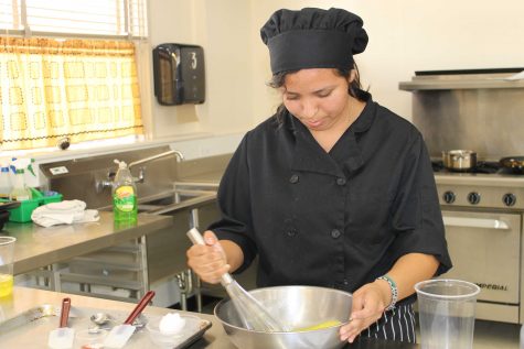 Senior Dora Estrada whisking eggs for her dish.
Photo by: Sarah Clench