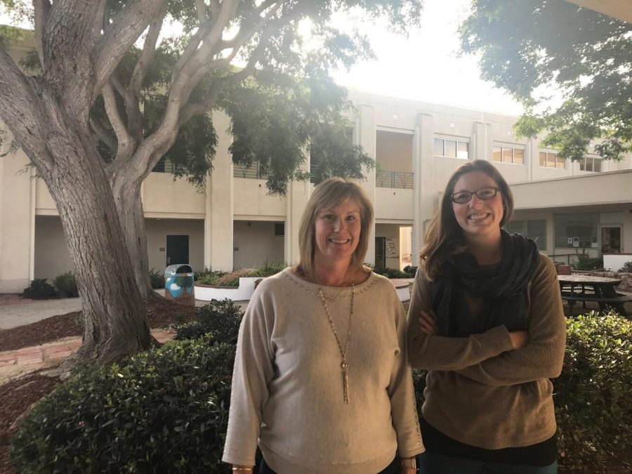 Beley (left) and Muska (right) state, If [our] door is open then a student is welcome. Photo by: Sarah Clench