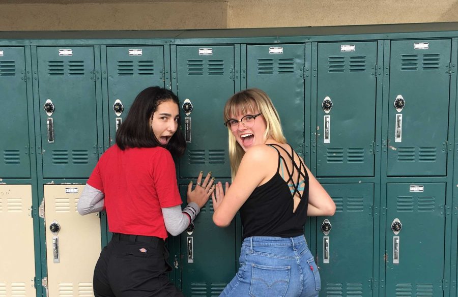 Martinez and Elson pictured showing off their outfits. Martinez found most of her outfit at the thrift store and second-hand shops. Elson takes part in the Levi’s and bralette trend. 
Photo by: Bailey Peck