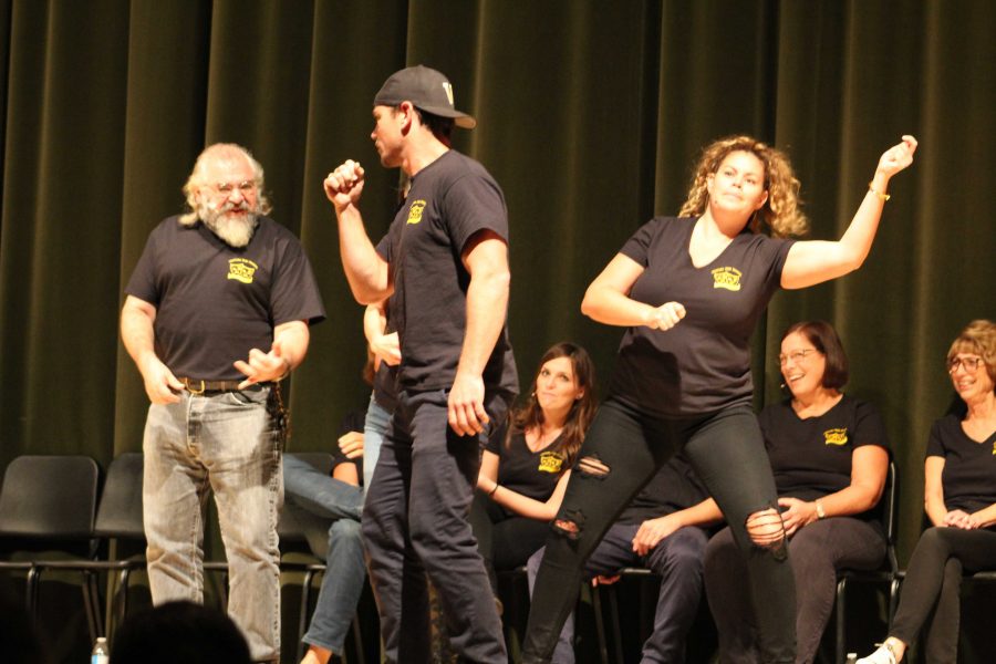(from left to right) Reich, Weber, and Hazan perform as a band during Movie Critics, where two others control the actions in the scene. Photo by: Avenlea Russian