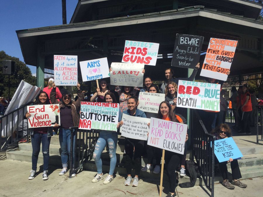 Students+with+their+protest+signs+after+the+march.+Photo+by+Brooke+Stevenson