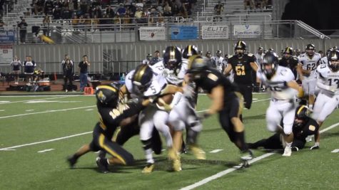 The Cougars heading towards the end zone in the first quarter. Photo by: Miles Bennet