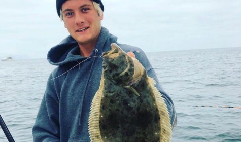 Cherrie posing with a California Halibut that he caught at Santa Cruz Island. picture credit: Instagram @weleycherrie_