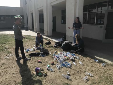 ASB representatives sorting through the recycled materials, making sure they can be sent to the plant. Photo by: Emily Neitz