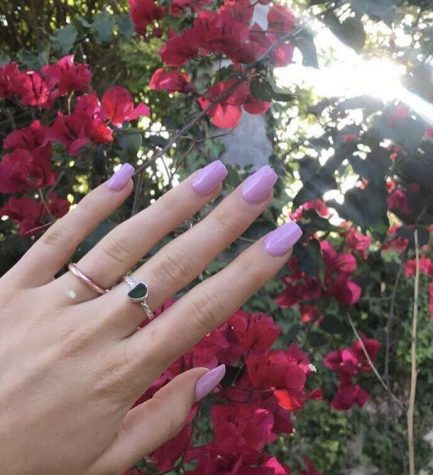 Sophomore Miranda Holguin loves her pastel pink acrylics. Photo by: Miranda Holguin