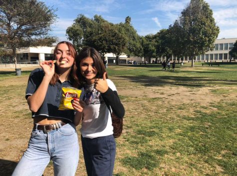 Senior River Winn (left) and sophomore Julianna Jacobs-Vargas (right) getting super pumped for their bank accounts to go in the single digits after all the cyber Monday deals they plan to snag. Photo By: Janelle Chavira