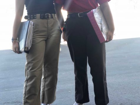 Juniors Kayla Swain (left) and Christine Trujillo (right) agreed that Dickies are more comfortable than skinny jeans and tight pants. Photo by: Sarah Clench