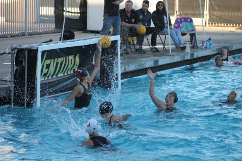 Sophomore goalie Lindsey McDermott blocks a shot early in the game. Photo by: Doug Sandford