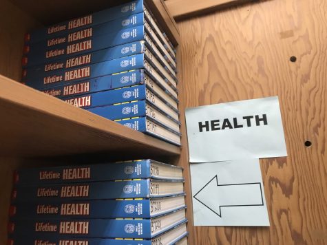The health textbooks located in the library used to teach the health course. Photo by: Doug Sandford