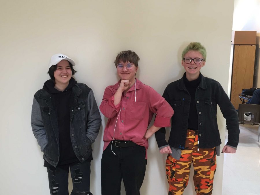 Transgender students, senior Alexander Crimes (left) and juniors Max Bolle (center) and Noah Tallent (right) use their clothing and mannerisms to express their gender identity.
Photo by: Miles Bennett