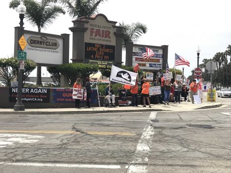 Protesters stand at the entrance to the County Fairgrounds. The website for NeverAgainCA – the Ventura chapter of which organized the protest – can be reached at https://neveragainca.blogspot.com. Photo by: Micah Wilcox