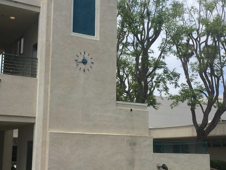 The blue clock that sits facing the senior lawn from the office side of it. Photo by: Garrett Jaffe