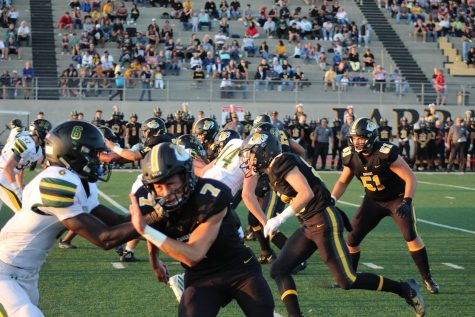 Wide receivers Junior Cade Ledesma (number 7) and Senior Zach Rodriguez (number 80) attempting to get open for the pass. Photo by: Logan Wilkov