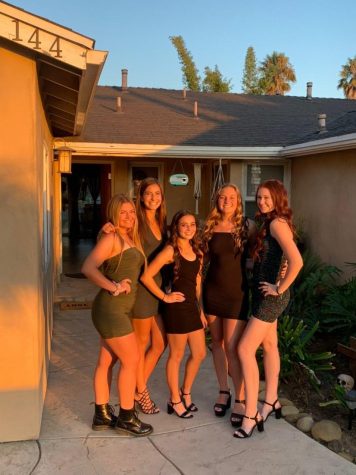 From left to right, seniors Kambria Haughton, Senna Togneri, Tatum Schmidt, Megan Ditlof and Samantha Henley styled heels or boots with a range of colored short skin tight dresses. Photo from Megan Ditlof