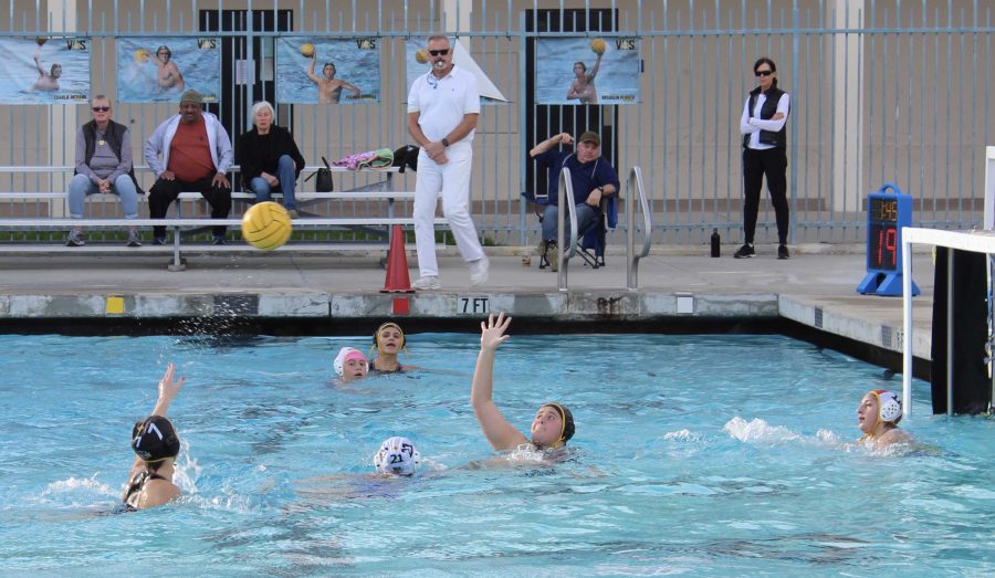 Senior Bella Torpey (number 7) passing the ball to junior Tenaya Romero (number 15) during the second quarter. Photo by: Jocelyn Lee