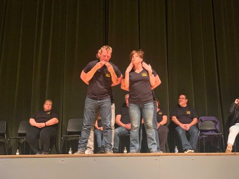 Sebastien DeClerck (pictured left) next to Linda Bergfeld (right) acting out a game where they pretend to be Oompa Loopas making chocolates. Photo by: Greta Pankratz