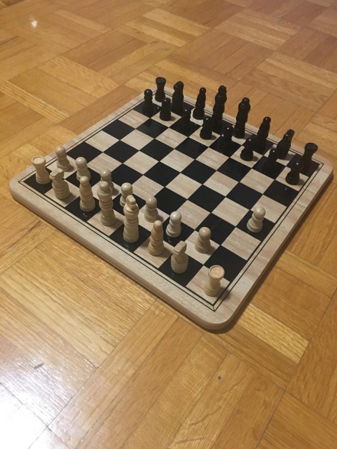 In+this+photo%2C+a+white+pawn+has+moved+two+spaces+forward+to+start+off+the+game.+Typically%2C+the+white+side+in+a+chess+game+will+start+off+first.+Photo+by+%3A+Emily+Nguyen