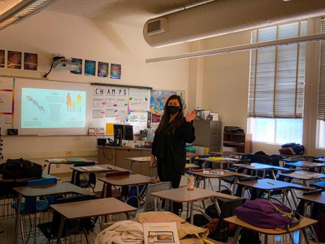 Ms. Ulvang welcoming her students in her classroom. Photo by: Adi DeClerck 