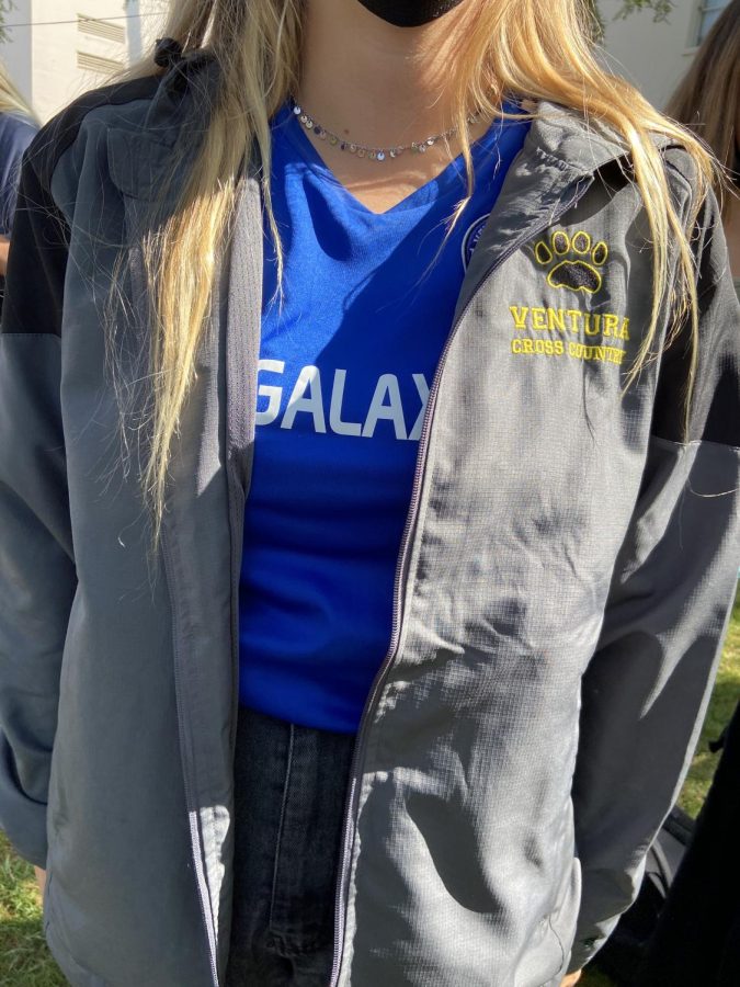 Freshman Olivia Mobley wore a Ventura Cross Country windbreaker jacket over a jersey. 