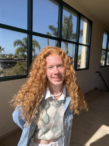 Senior Grace Morton said, “I like [my hair]. I definitely think it makes me unique but people call me ‘Merida’ because my hair is curly and looks exactly like Merida so that kind of annoys me, but for the most part I really like my hair being unique and different.” Photo by: Alina Reitz