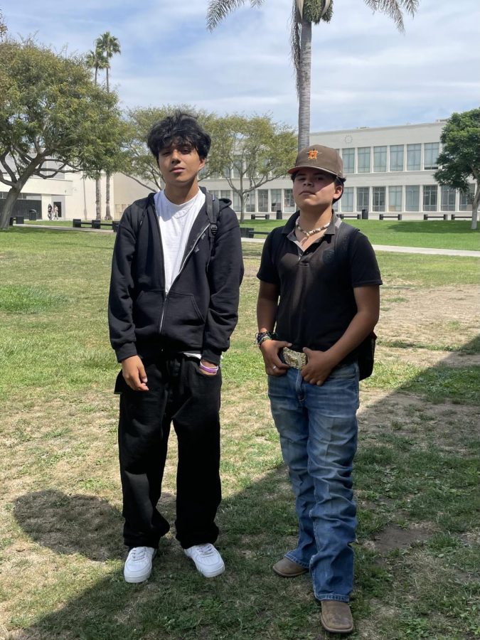 I love my step ups. I love my 501s. I love my Air Forces, said Hector Smindset 26 (left). Hes an Edgar without the haircut, said Oscar Grano 26 (right). Photo by: Julian Martinez  