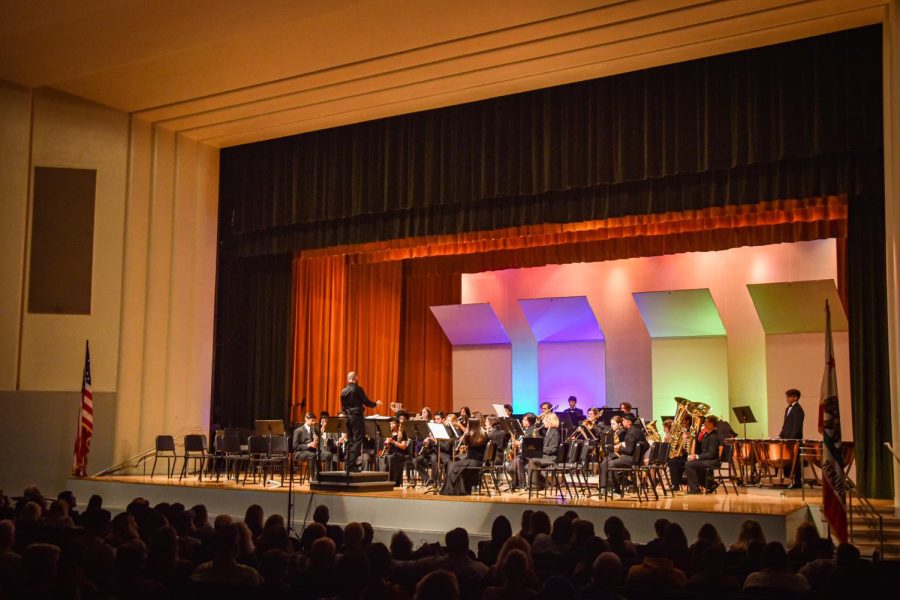 VHS Instrumental Music Director Paul Hunt (center-left) conducts the wind ensemble. In chronological order, the concert featured performances by the studio jazz ensemble, wind ensemble, symphony orchestra, wind ensemble honors and honors symphony orchestra (string orchestra honors and wind ensemble honors). The studio jazz ensemble performed “Mas Que Nada,” “Bellavia” and “Spain.” The wind ensemble performed “Quixotic Episode” and “Oblivion.” The symphony orchestra performed “Appalachian Morning” and “American Landscapes.” The wind ensemble honors performed “Windsprints” and “Danzon No. 2.” The honors symphony orchestra performed “Song of the Universal for Piano,” “Strings on Fire, “Star Wars, The Adventures of Han” and “Robin Hood, Prince of Thieves.” Photo by: Adi DeClerck