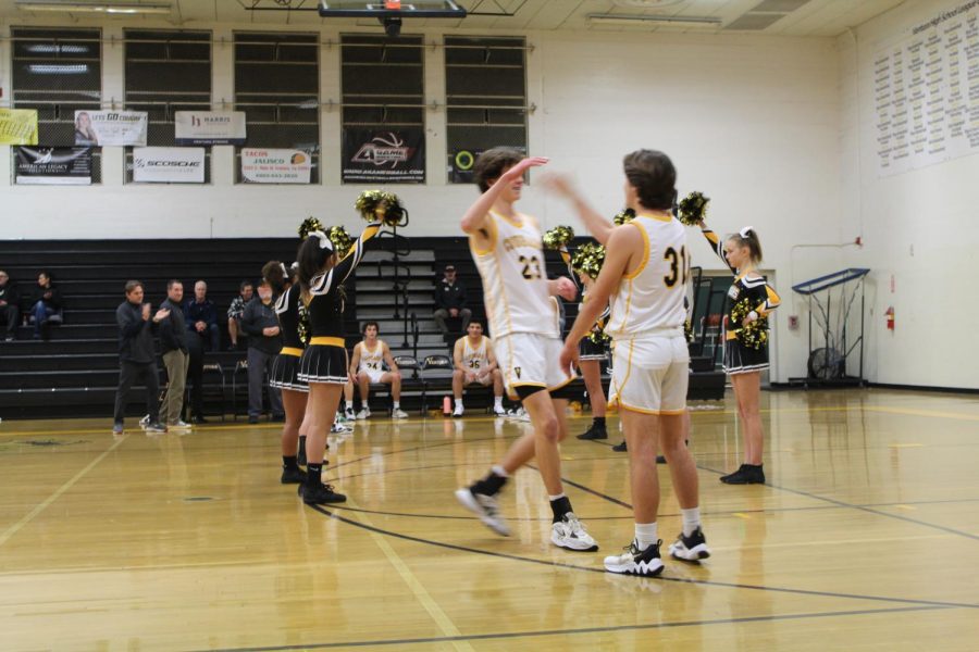 On Tuesday, Dec. 13, the VHS varsity boys basketball team played against San Marcos High School. The starting five players were announced and followed by a handshake with Mac Hannah ‘23 (pictured No. 31). The starters for the Dec. 13 game were Jake Auster ‘24, Jonathan Gurrola ‘24, Jack Rose ‘23, Caleb Sebek ‘25 (pictured No. 23) and Travis Valenzuela ‘24. Photo by: Lourdes Almalab