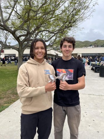Jonathan Kelley ‘26 and Theo Southerpasquarella ‘26. Kelley said, “I feel pretty good. The school year wasnt too hard. It was fun, I got to make a lot of new friends, I got to play a lot of sports. It was a good freshman experience.” Southerpasquarella right, said, “I got to meet tons of new people I had never met and I had a really good experience by playing sports like volleyball and cross country, as well as getting to experience what high school is like for the first year.” Photo by: Jane Armstrong