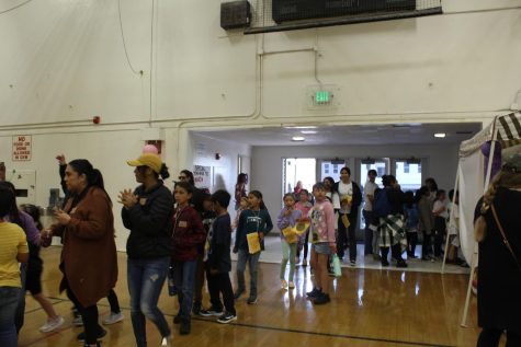 Elementary school students visited the Tuttle Gym and Main Street Gym for the Readers Faire, and went from story to story. Photo by: Samantha Castañeda