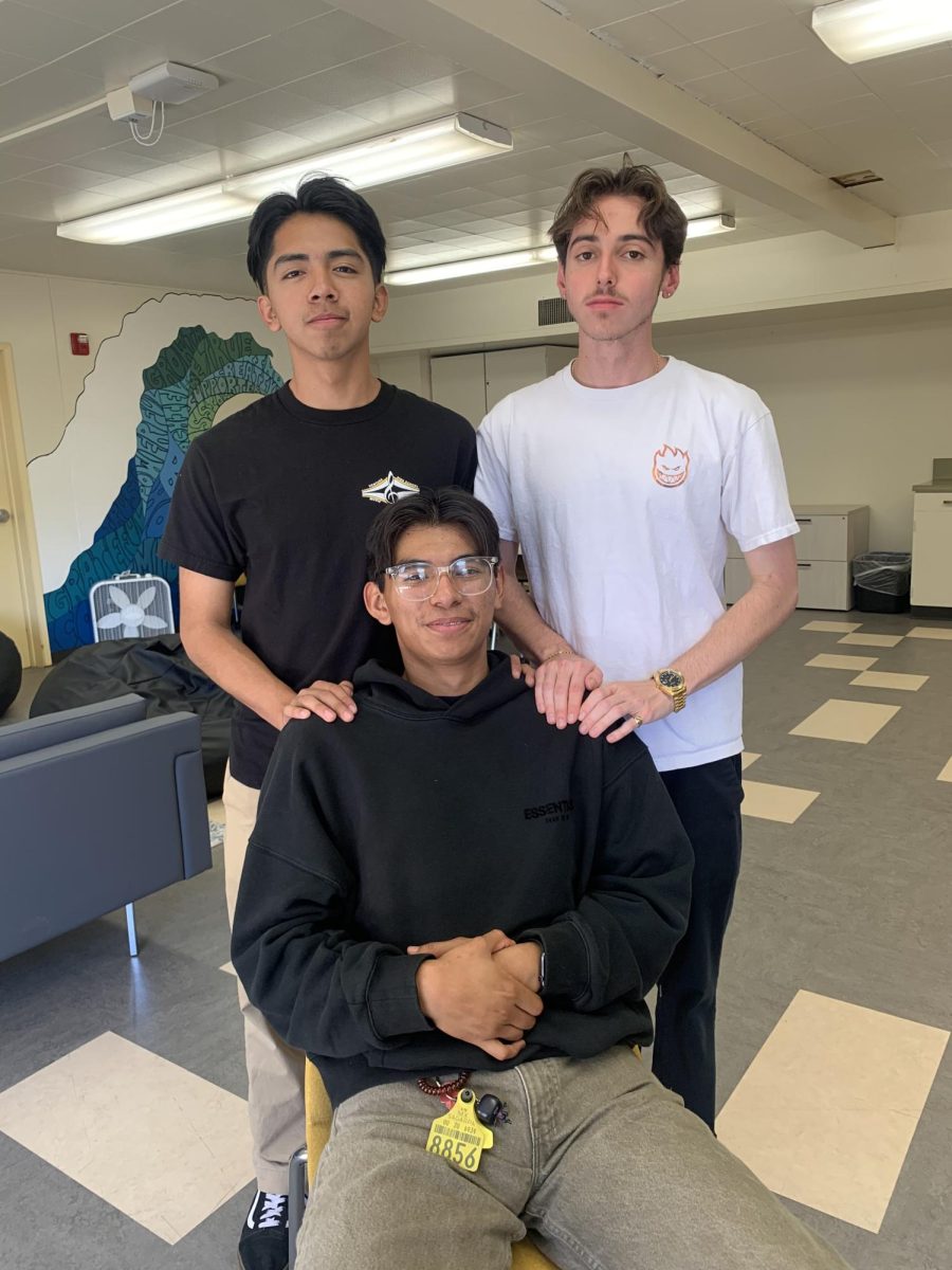 Gio Morales ‘25 (middle) said, “My mom is an important person in my life [because] she cares about me. Shes always there for me even if I’m in the wrong. Always there to teach me lessons, but she’s doing it because she loves me.” Other students pictured are Angel Ramirez ‘25 (left) and Josh Stewart ‘24 (right). Photo by: Journey Quan
