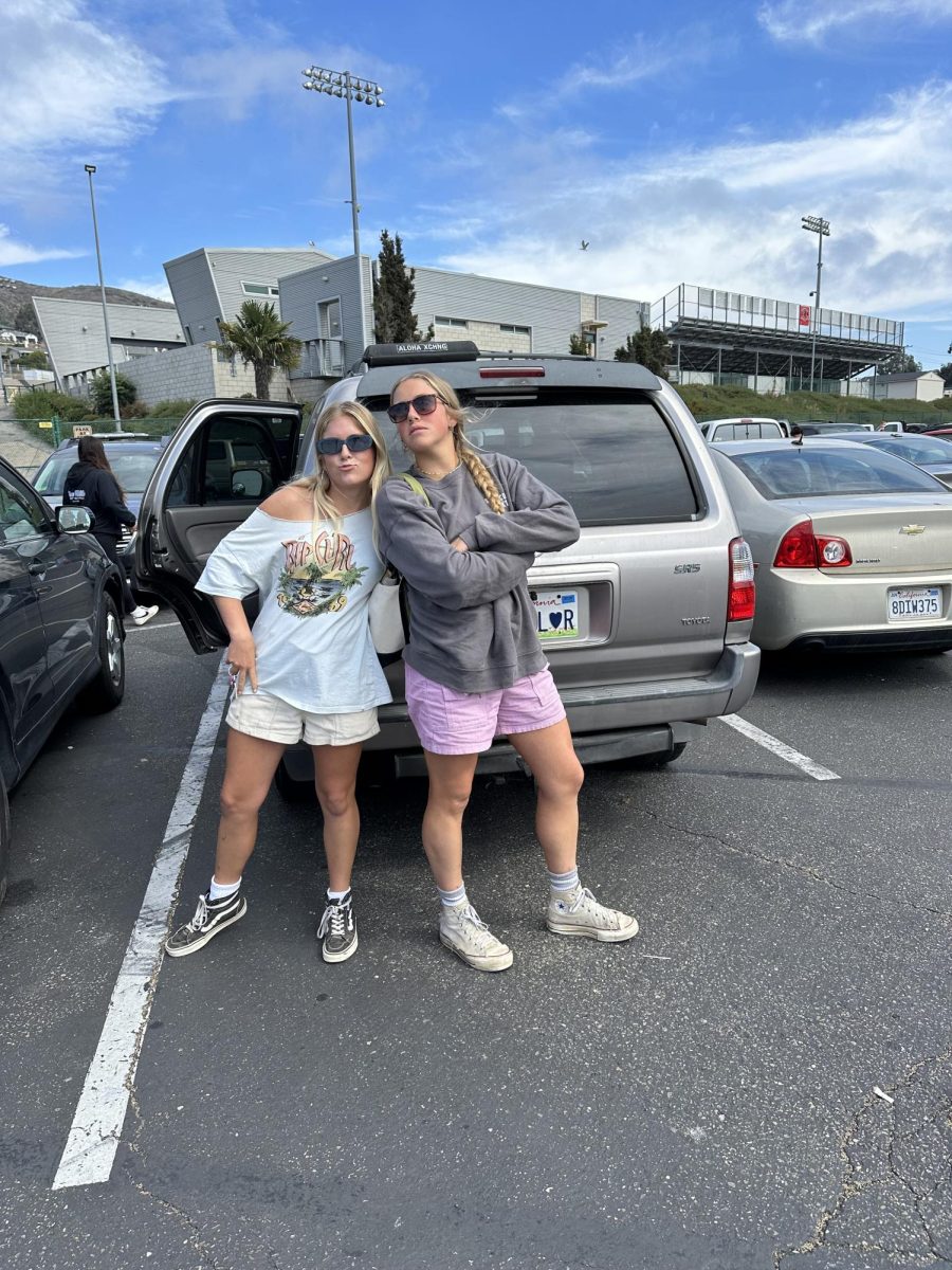(Left to right) ASB members Bailey Burman ‘25 and Olivia Mobley ‘25 participated in the Monday Oct. 9 “West Coast Best Coast” beach gear theme. Photo by: Sophia Denzler
