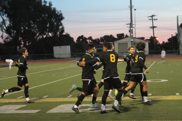 The team celebrated their goal. Photo by: Vail Newman

