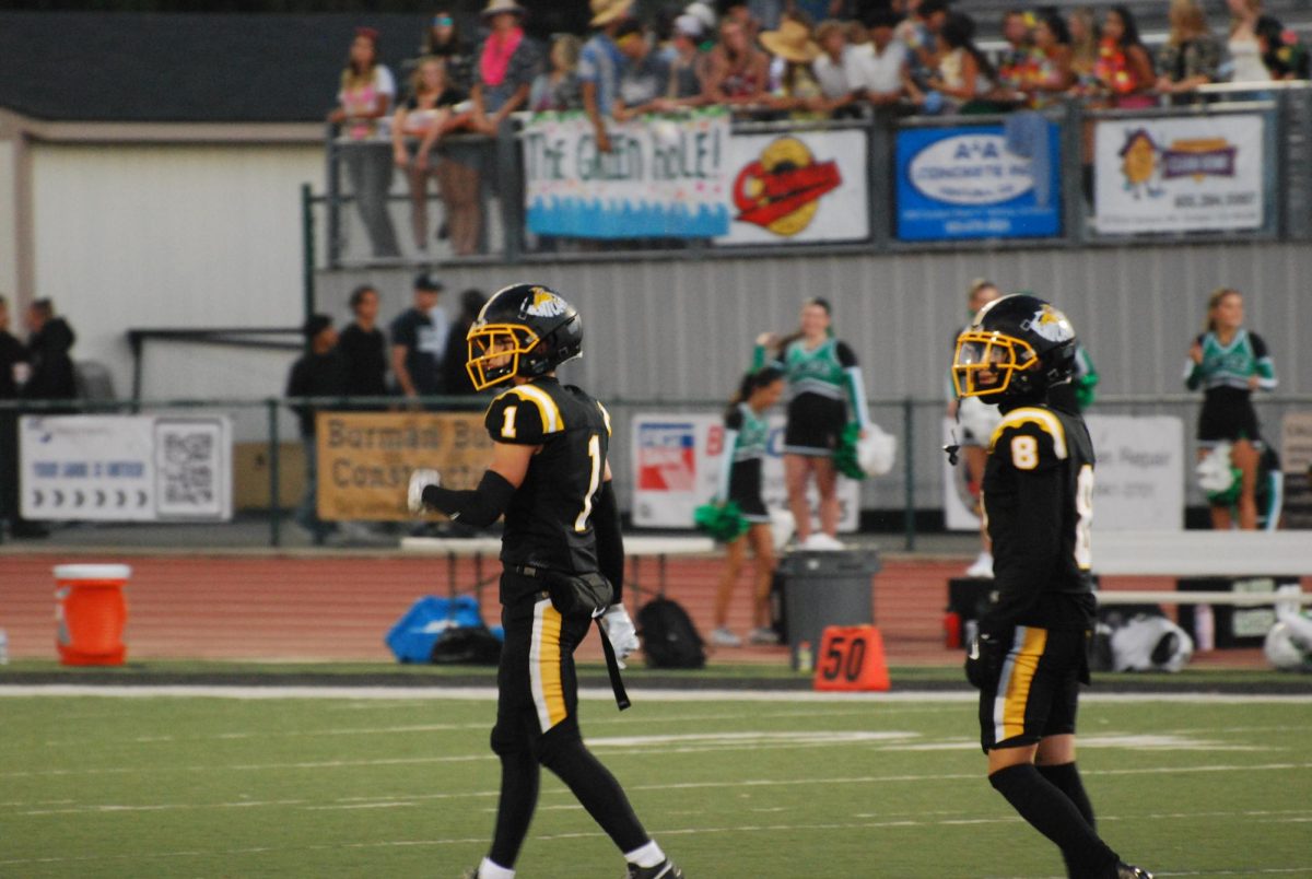 (Left to right) Gavin Calderon '25 and Daniel Munoz '25. Calderon has been playing football for nine years. He plays safety and is number one. Photo by: Brynn Kightlinger
