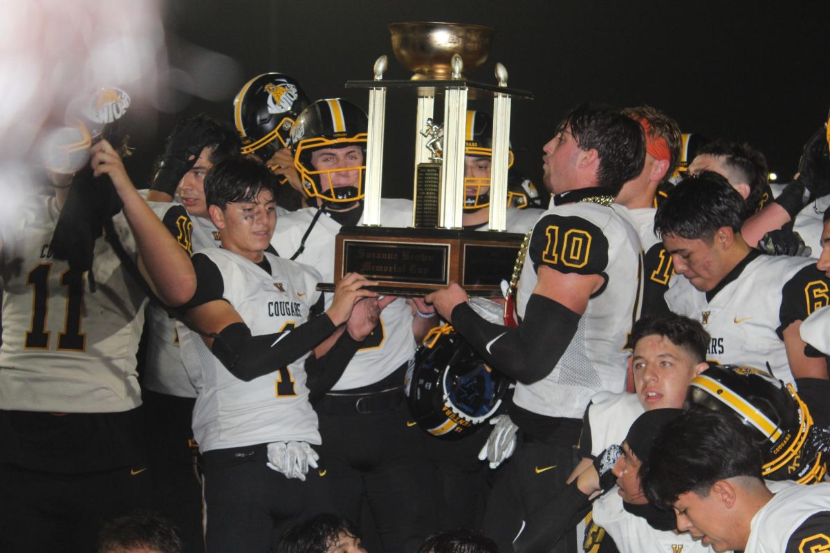 Cougars shown in aftermath of their victory against Buena, taking the rivalry trophy home to VHS. Photo by: Samantha Martinez
