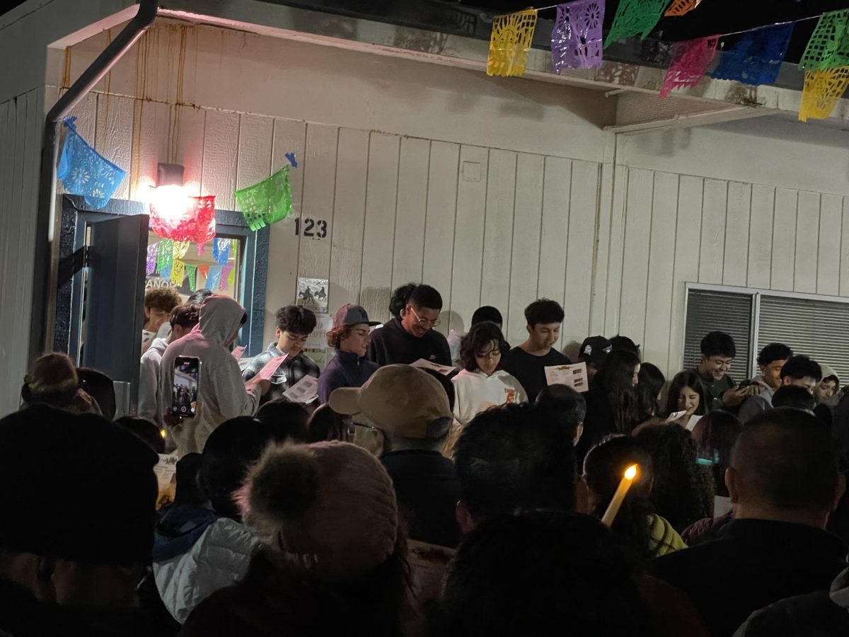 Las Posadas carols being sung outside of room 123. Photo by: Emma Blackburn