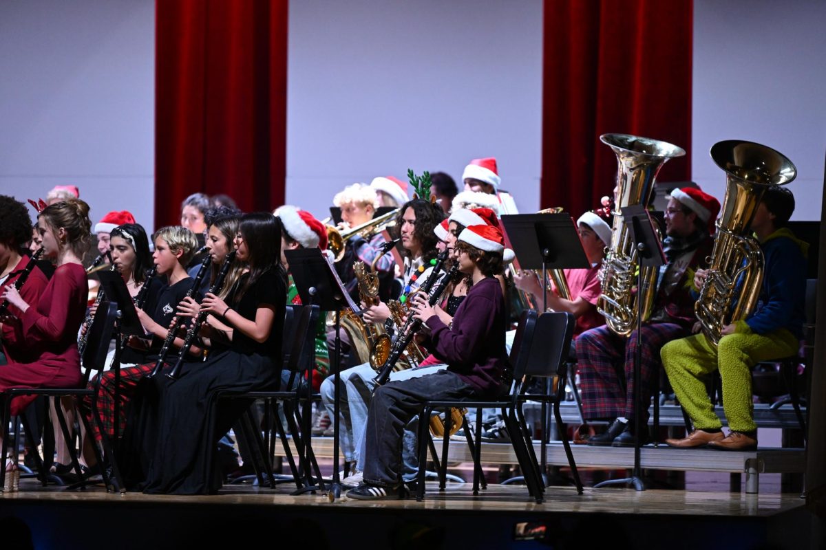 Wind ensemble takes the stage and plays “The Nightmare Before Christmas.” Photo by: Hung Lam