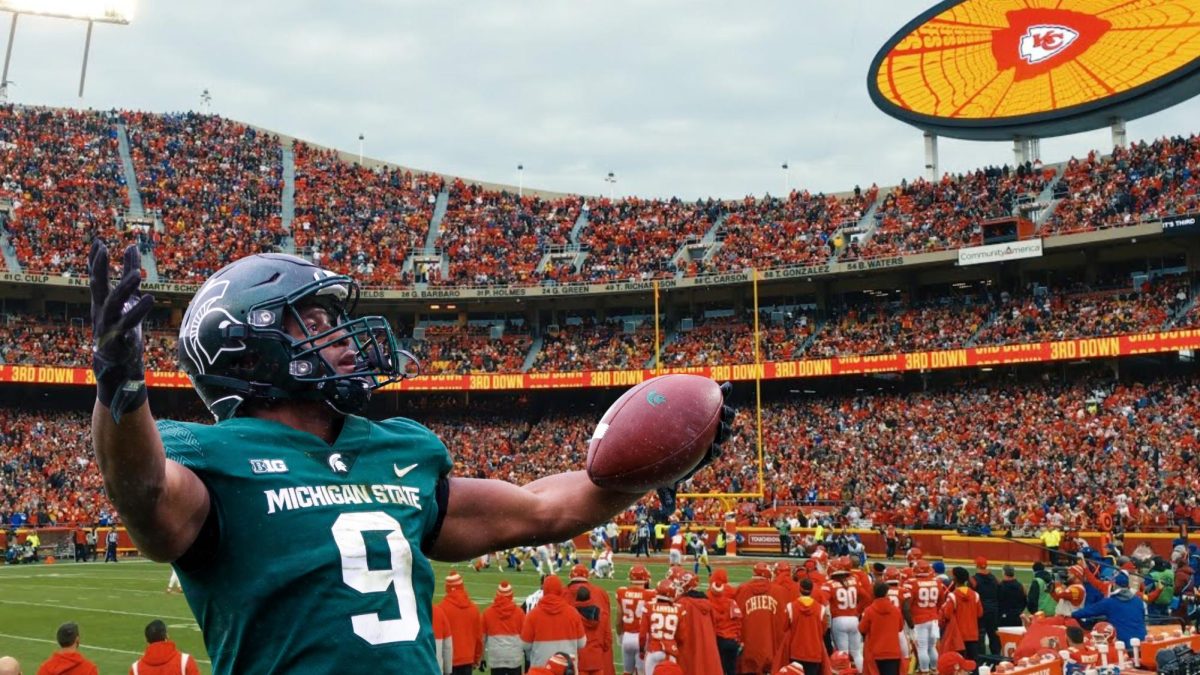 Kenneth Walker III in his Michigan State uniform standing in the Chief's stadium. Graphic by: Henry Mattesich